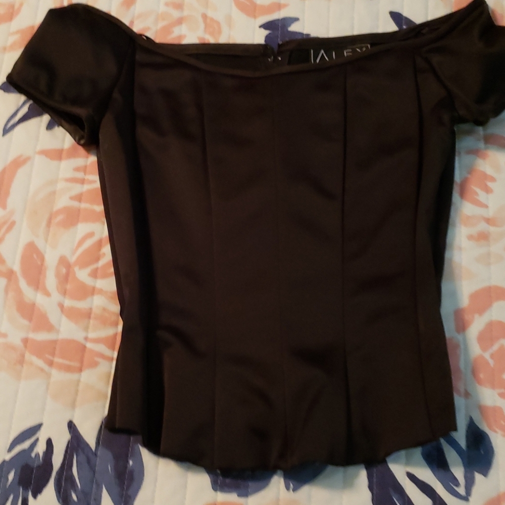 Two piece black satin evening top and skirt.